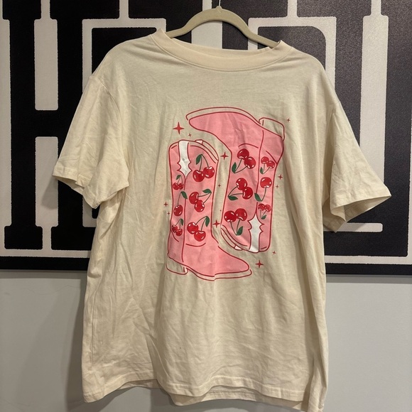 Pink Lily Tops - Pink Lily Cream Tee with Pink Boots Design